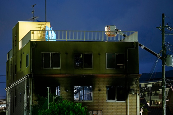 (Hiromi Tanoue | AP Photo) The building of Kyoto Animation is seen following a fire in Kyoto, western Japan, Thursday, July 18, 2019. The fire broke out in the three-story building in Japan's ancient capital of Kyoto, after a suspect sprayed an unidentified liquid to accelerate the blaze, Kyoto prefectural police and fire department officials said.