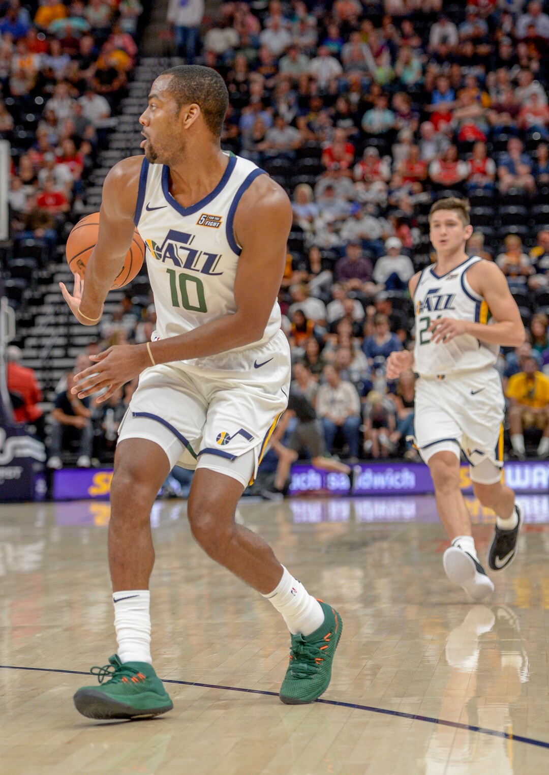 Leah Hogsten  |  The Salt Lake Tribune   Utah Jazz guard Alec Burks (10) passes back to Utah Jazz guard Grayson Allen (24) who drops a 3-pointer as the Utah Jazz host the Perth Wildcats, Sept. 29, 2018 at Vivint Smart Home Arena.