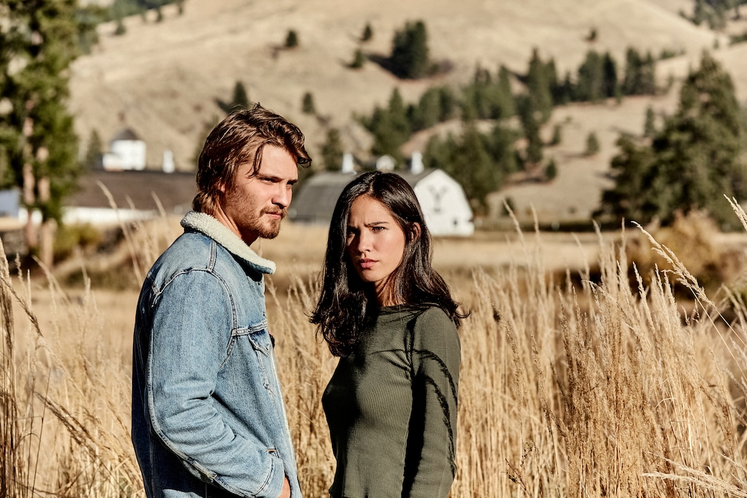 This image released by Paramount Network shows Luke Grimes, left, and Kelsey Asbille from the series "Yellowstone" premiering Wednesday, June 20. (Kevin Lynch/Paramount Network via AP)