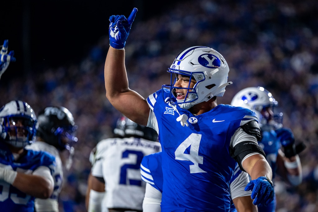 (Trent Nelson  |  The Salt Lake Tribune) BYU Cougars running back LJ Martin (4) scores a touchdown as BYU hosts TCU, NCAA football in Provo on Saturday, Nov. 15, 2025.