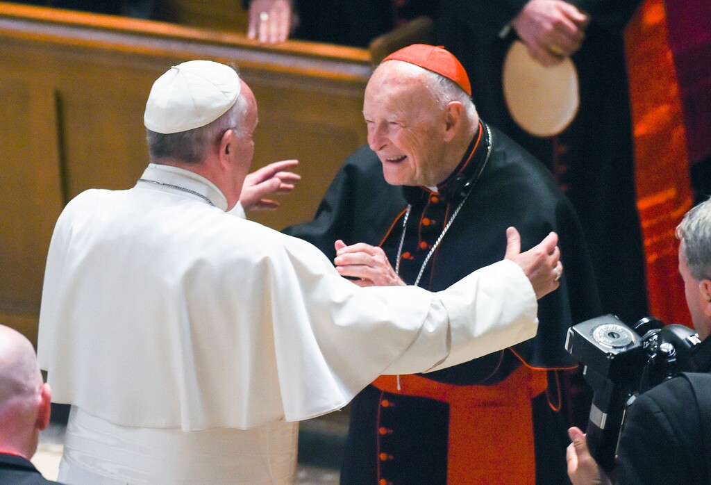 (Jonathan Newton/The Washington Post via AP, Pool, File) In this Sept. 23, 2015, photo, Pope Francis reaches out to hug Cardinal Archbishop emeritus Theodore McCarrick after the Midday Prayer of the Divine with more than 300 U.S. Bishops at the Cathedral of St. Matthew the Apostle in Washington.