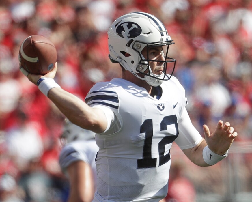 BYU quarterback Tanner Mangum throws during the first half of an NCAA college football game against Wisconsin Saturday, Sept. 15, 2018, in Madison, Wis. (AP Photo/Morry Gash)