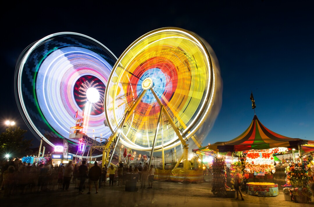 (Rick Egan  |  The Salt Lake Tribune)  The Midway glows at night at the Utah State Fair,  Monday, September 11, 2017.