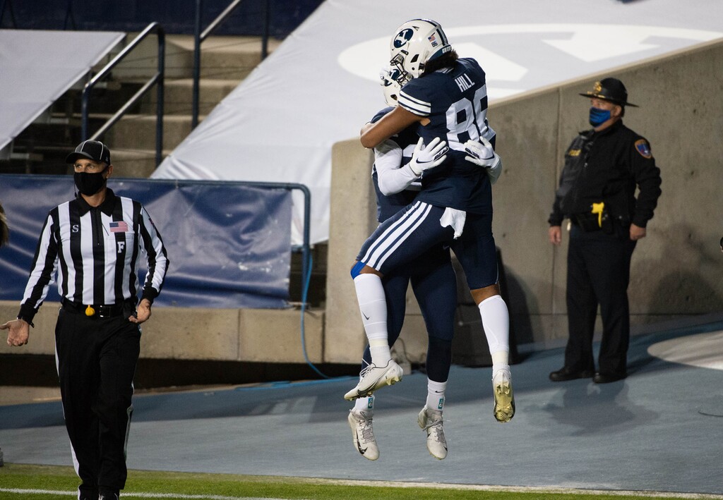 (Francisco Kjolseth | The Salt Lake Tribune) Brigham Young Cougars wide receiver Keanu Hill (86) celebrates a second touchdown by BYU as they take on Texas State in an NCAA college football game at LavVell Edwards Stadium, Saturday, oct. 24, 2020, in Provo, Utah.