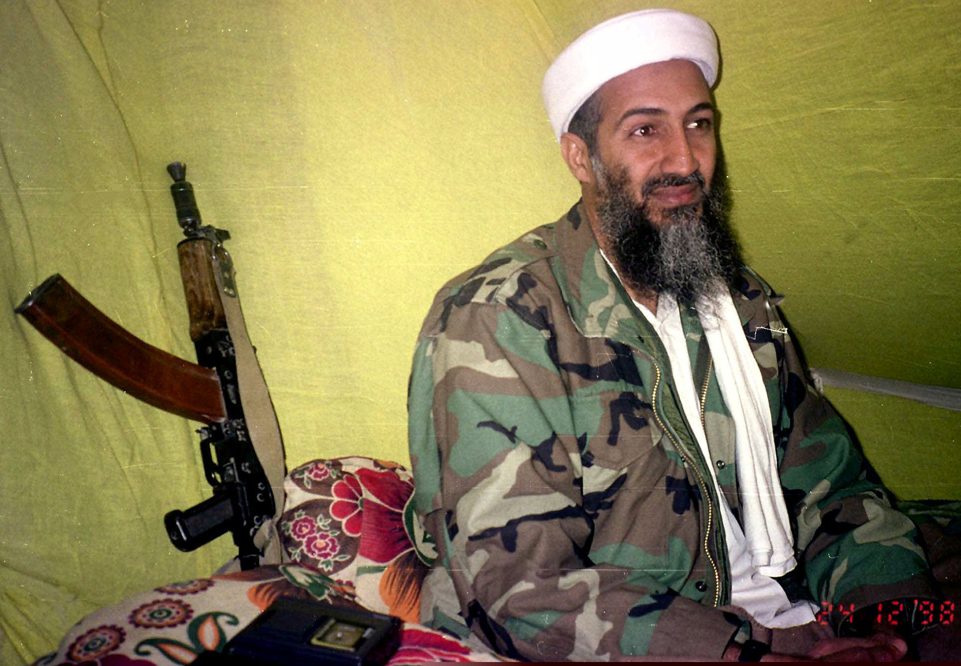 (Rahimullah Yousafzai | AP photo)

In this Dec. 24, 1998, photo, al-Qaida leader Osama Bin Laden speaks to a selected group of reporters in mountains of Helmand province in southern Afghanistan.