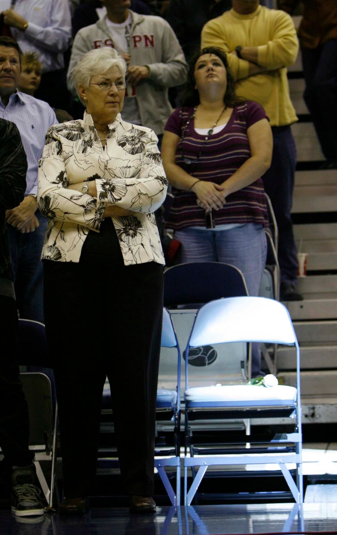 (Trent Nelson  |  Tribune file photo) Gail Miller stands next to the courtside chair of her late husband, Larry H. Miller, during a pregame tribute to the Jazz owner Saturday February 21, 2009. Larry H. Miller died the day before.