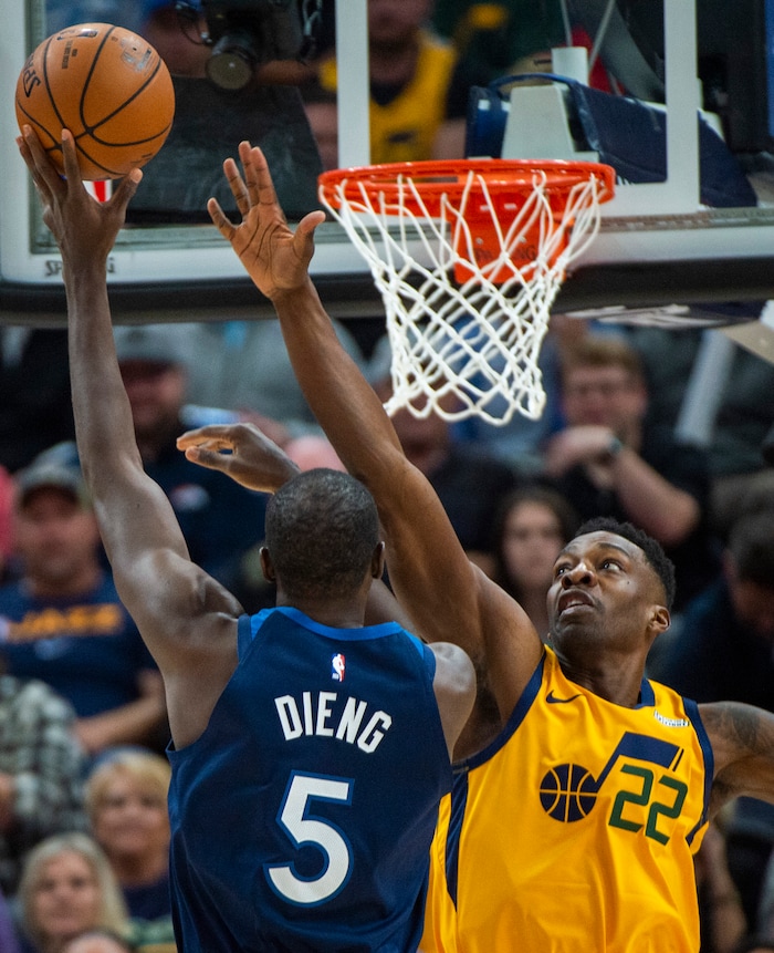 (Rick Egan  |  The Salt Lake Tribune)     Minnesota Timberwolves center Gorgui Dieng (5) shoots over Utah Jazz forward Jeff Green (22), in NBA action between the Utah Jazz and the Minnesota Timberwolves in Salt Lake City, Monday, Nov. 18, 2019.