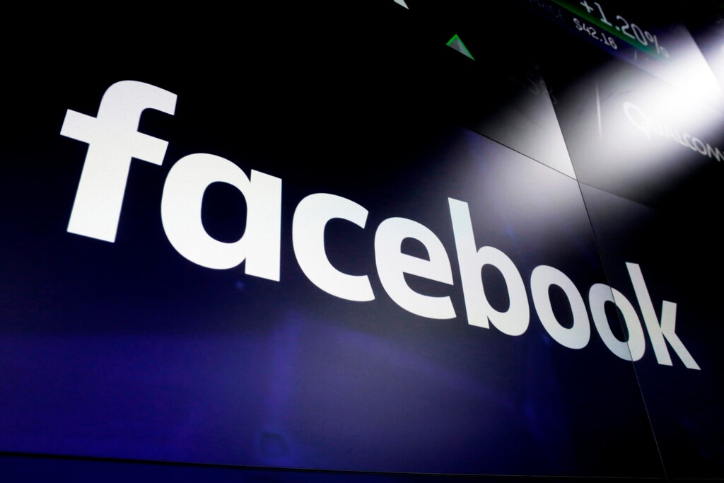 (Richard Drew | The Associated Press) In this March 29, 2018, file photo, the logo for Facebook appears on screens at the Nasdaq MarketSite in New York's Times Square. Myanmar’s powerful military chief is among 20 individuals and organizations that Facebook says it is banning from its site in order to “prevent the spread of hate and misinformation." The action Monday comes after the social media giant was criticized for being used to inflame ethnic and religious conflict in the country, particularly against Rohingya Muslims. Some 700,000 Rohingya fled their homes in western Myanmar over the past year.