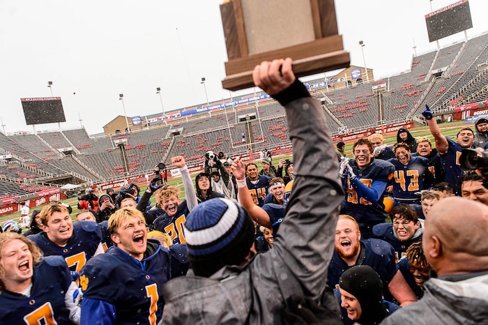 (Trent Nelson | The Salt Lake Tribune)  Orem players celebrate the win over Mountain Crest in the Class 4A High School State Football Championship game in Salt Lake City, Friday November 17, 2017.