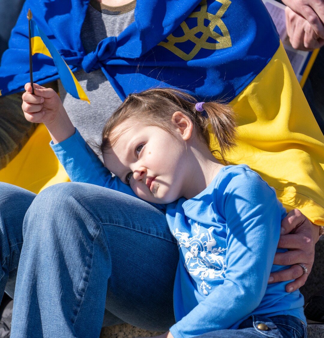 (Rick Egan | The Salt Lake Tribune) Katya Bues, 5, listens to a song, she gathers on the Capitol steps for a protest against Russia's invasion of Ukraine, organized by the Utah Ukrainian association, on Saturday, March 12, 2022.