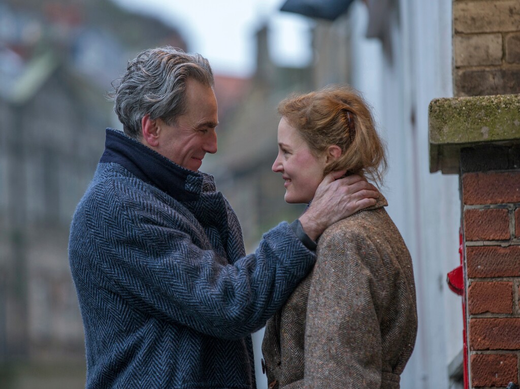 In this image released by Focus Features, Daniel Day-Lewis, left, and Vicky Krieps appear in a scene from "Phantom Thread."  (Laurie Sparham/Focus Features via AP)