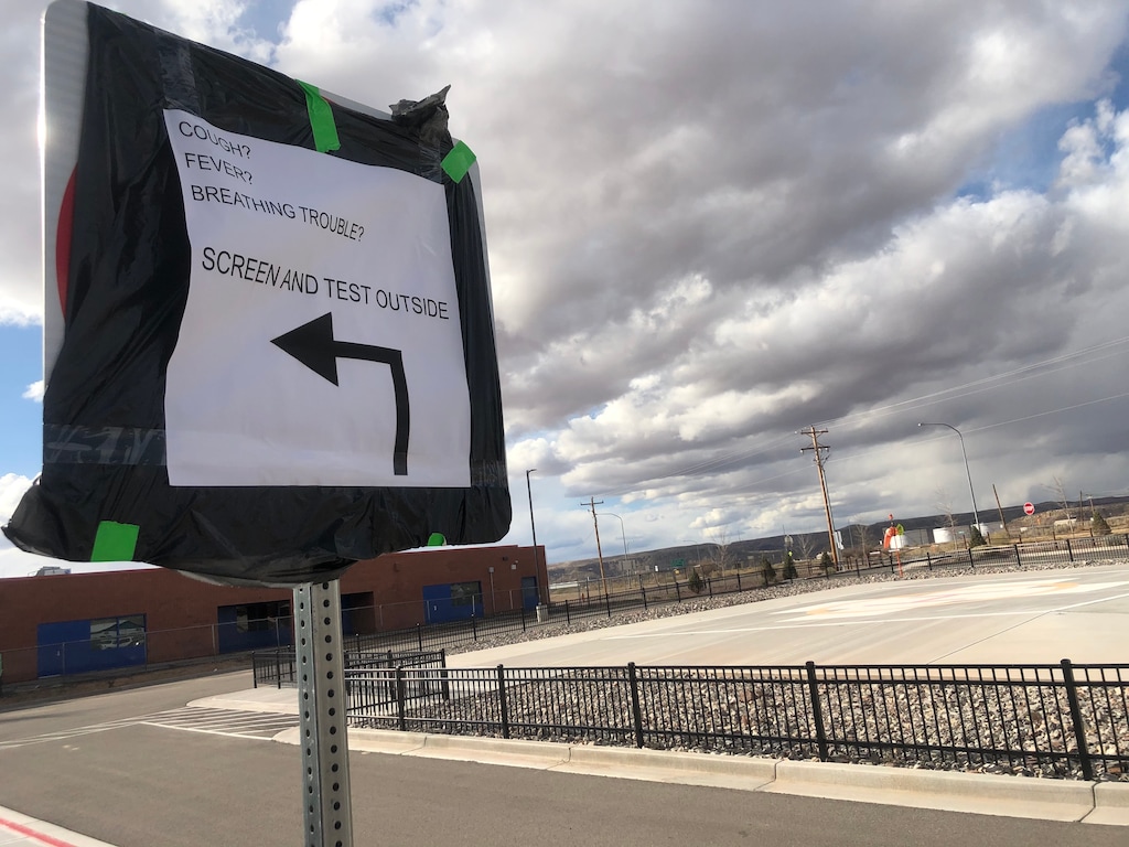 (Zak Podmore | Tribune file photo) This March 20, 2020, file photo shows a sign directing people to outdoor screening to protect health care workers from the spread of coronavirus at Utah Navajo Health System clinics in San Juan County.
