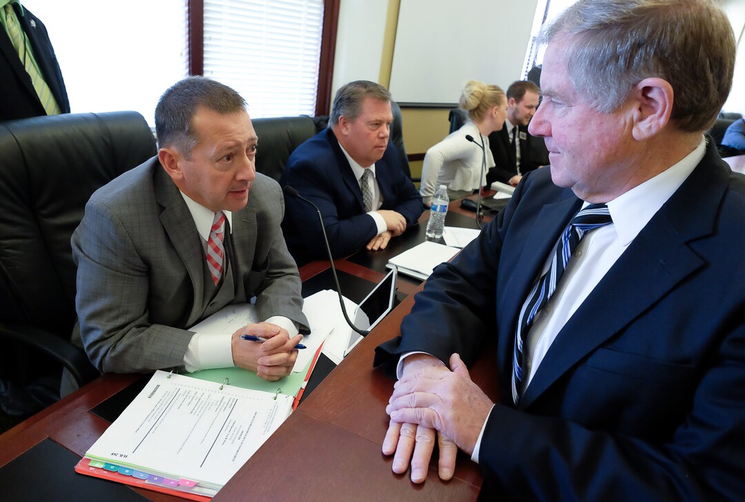 (Francisco Kjolseth  |  The Salt Lake Tribune)  Rep. Paul Ray, R-Clearfield, left, speaks with Reed Richards, with the Utah Association of Prosecutors, following a hearing on HB379 which would end the death penalty in Utah. Ray who sits on the House Law Enforcement and Criminal Justice Standing Committee tried unsuccessfully to hold the bill.