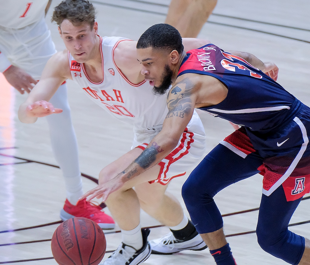 (Leah Hogsten | The Salt Lake Tribune) Utah Utes forward Mikael Jantunen (20) battles Arizona's Terrell Brown Jr. as the University of Utah host the Arizona Wildcats, Feb. 4, 2021 at the Jon M. Huntsman Arena. 