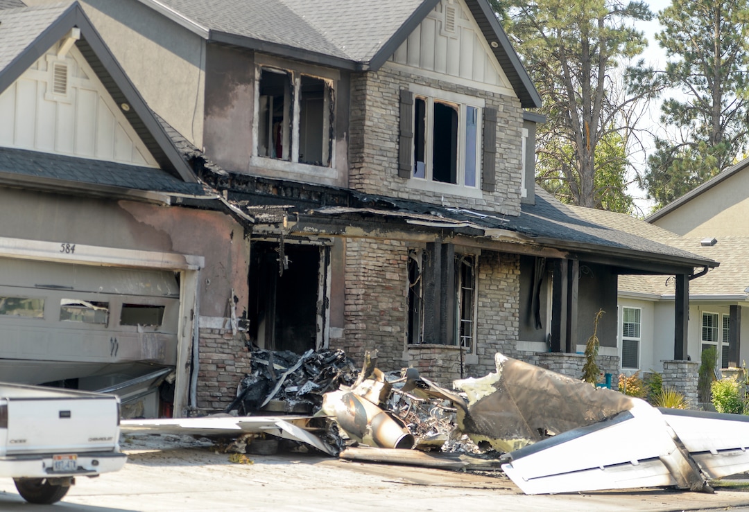 Leah Hogsten  |  The Salt Lake Tribune   The  house at 584 E. East Canyon Road in Payson where Duane "Rhedd" Youd, 47, crashed a plane about 2:30 a.m., Monday, August 13, 2018. Firefighters arrived to find the home engulfed in flames. The two people inside the home escaped through the back of the home and were uninjured. Youd had been booked into the Utah County Jail about 7:30 p.m. Sunday after being suspected of assaulting his wife. He bailed out of jail; returned to the home with a police officer about midnight to retrieve belongings and his truck; and left without incident.