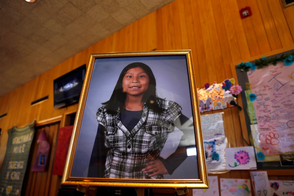 This May 6, 2016 file photo shows a portrait of Ashlynne Mike on display inside the lobby of the Farmington Civic Center in Farmington, N.M. Tom Begaye, who pleaded guilty to murder and sexual assault in the death of 11-year-old Ashlynne Mike on the largest American Indian reservation, is set to be sentenced. Begaye is scheduled Friday, Oct. 20, 2017 to receive life in prison for the May 2016 killing that prompted calls to expand the Amber Alert system and the death penalty to tribal communities across the U.S. (Jon Austria/The Daily Times via AP, File)