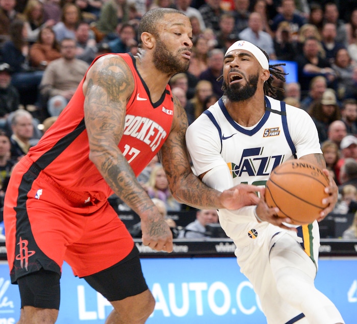 (Leah Hogsten  |  The Salt Lake Tribune) Utah Jazz guard Mike Conley (10) rounds the defense of Houston Rockets forward P.J. Tucker (17).  The Utah Jazz host the Houston Rockets at Vivint Arena, Feb. 22, 2020.