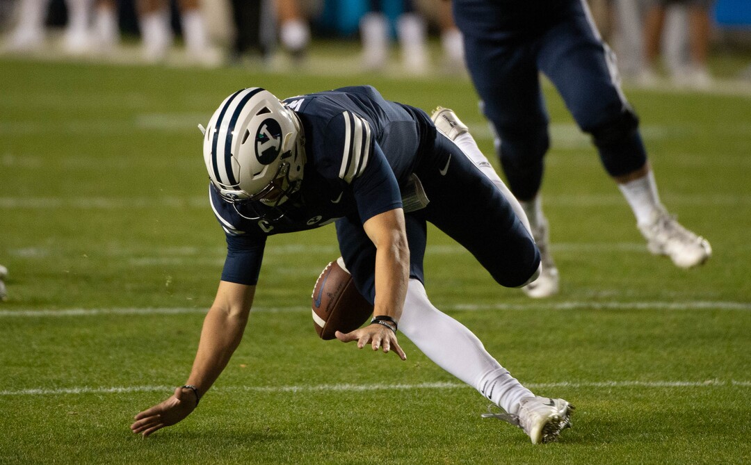 (Francisco Kjolseth  |  The Salt Lake Tribune) Brigham Young Cougars quarterback Zach Wilson (1) fumbles a snap recovered by Texas State near the end zone before the defensive lineup was able to stop any attempts at a touchdown by Texas State during an NCAA college football game at LavVell Edwards Stadium, Saturday, oct. 24, 2020, in Provo, Utah.