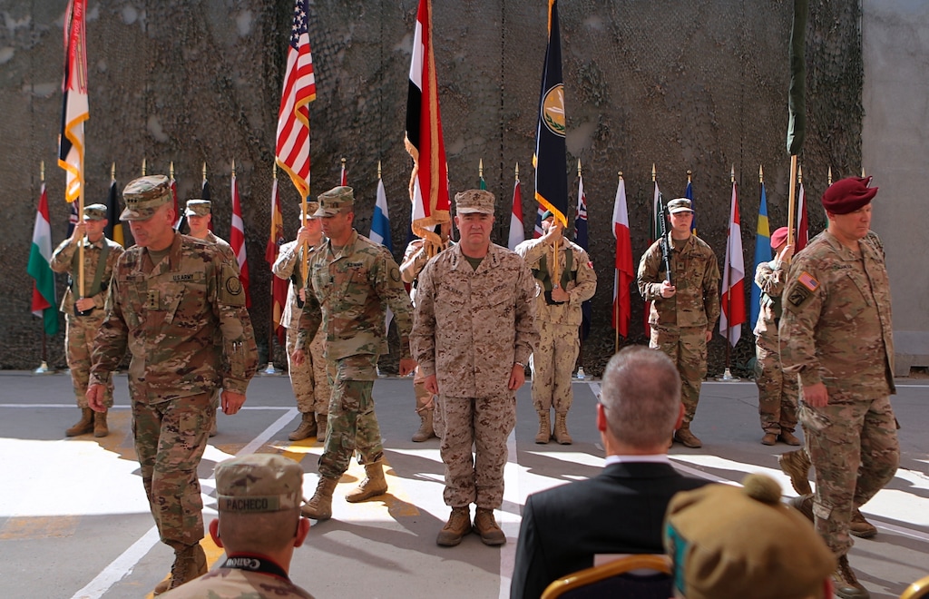 (Khalid Mohammed | AP file photo) U.S. Army Lt. Gen. Pat White, III Armored Corps Commanding General, second left, and Commanding General for U.S. Central Command Gen. Kenneth F. McKenzie Jr. center, take part in a transfer of authority ceremony in Sept. 14, 2019, at Union III, base in Baghdad, Iraq. On Sunday, Jan. 5, 2020, Iraq's parliament voted in favor of a resolution that calls for ending foreign military presence in the country two days after an Iranian general and a top commander were killed in a U.S. airstrike. The resolution specifically calls for ending an agreement in which Washington sent troops to Iraq more than four years ago to help in the fight against the Islamic State group.