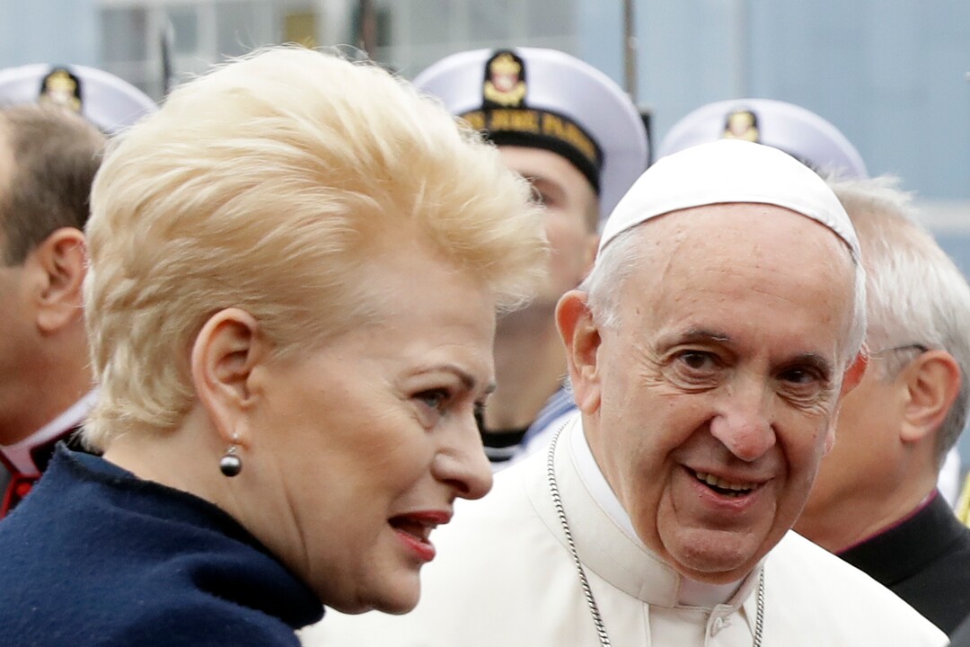 (Andrew Medichini  |  AP Photo)  Pope Francis is welcomed by Lithuanian President Dalia Grybauskaite as he arrives at Vilnius airport, Lithuania, Saturday, Sept. 22, 2018. Pope Francis begins a four-day visit to the Baltics amid renewed alarm about Moscow's intentions in the region it has twice occupied.