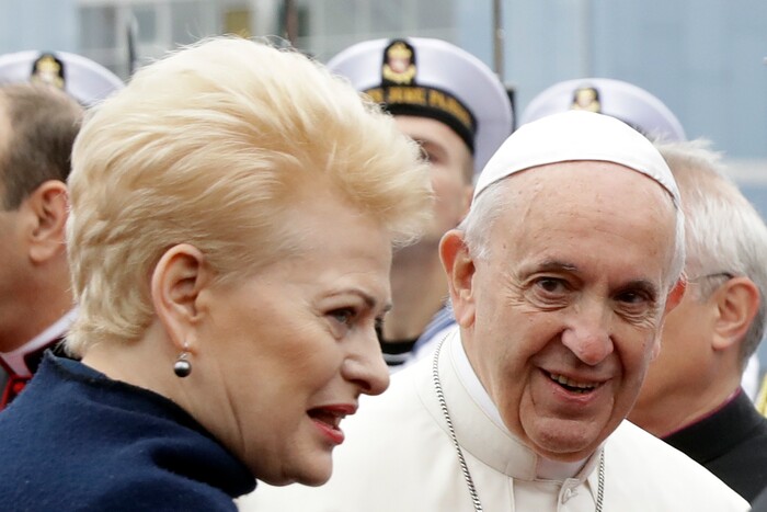 (Andrew Medichini  |  AP Photo)  Pope Francis is welcomed by Lithuanian President Dalia Grybauskaite as he arrives at Vilnius airport, Lithuania, Saturday, Sept. 22, 2018. Pope Francis begins a four-day visit to the Baltics amid renewed alarm about Moscow's intentions in the region it has twice occupied.