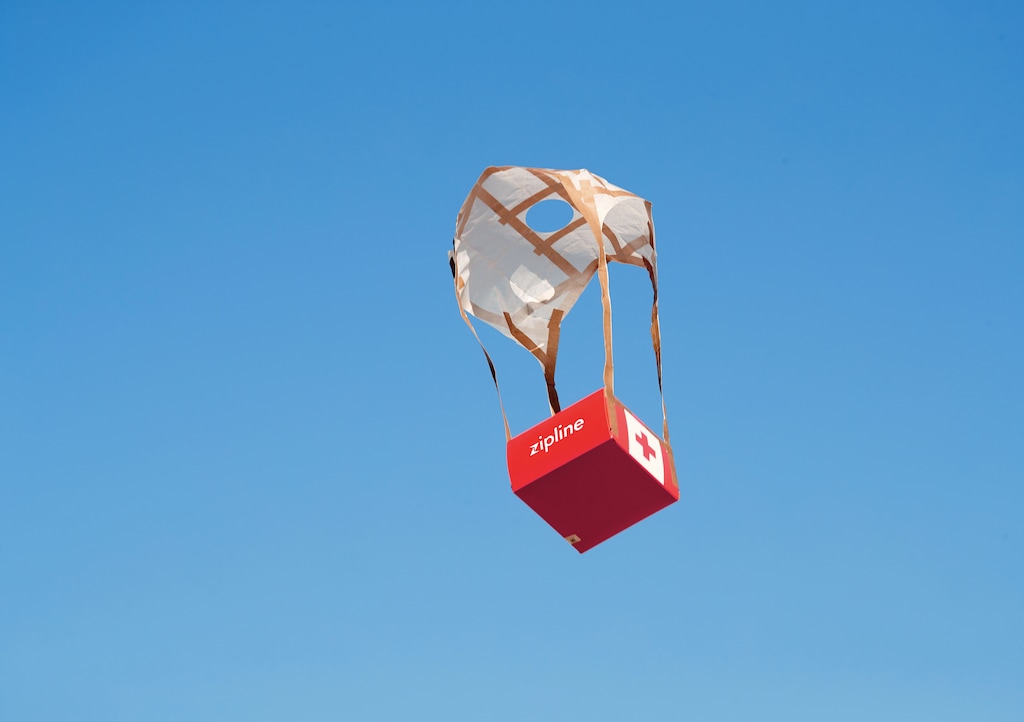 (Courtesy of Zipline) A package with a parachute dropped from a Zipline aircraft in Rwanda.