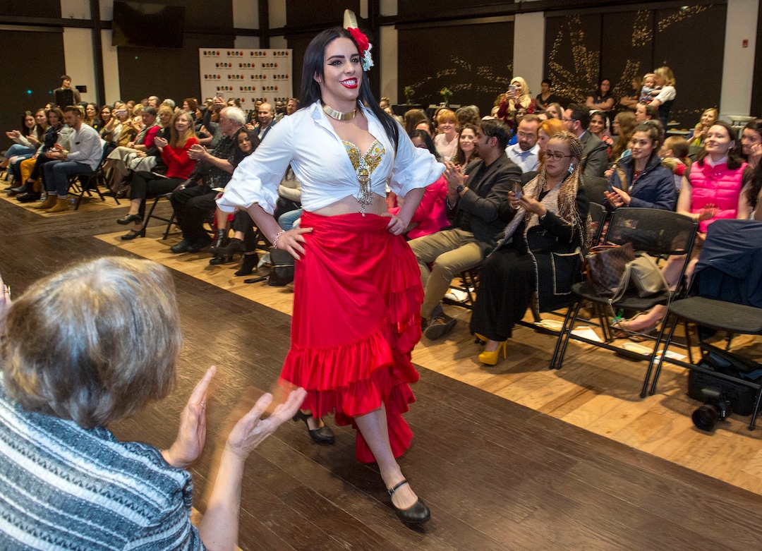 (Rick Egan  |  The Salt Lake Tribune)    Geisell Mardi walks the runway representing Cuba, at the 9th annual Women of the World Fashion Show Gala, Wednesday, March 6, 2019.