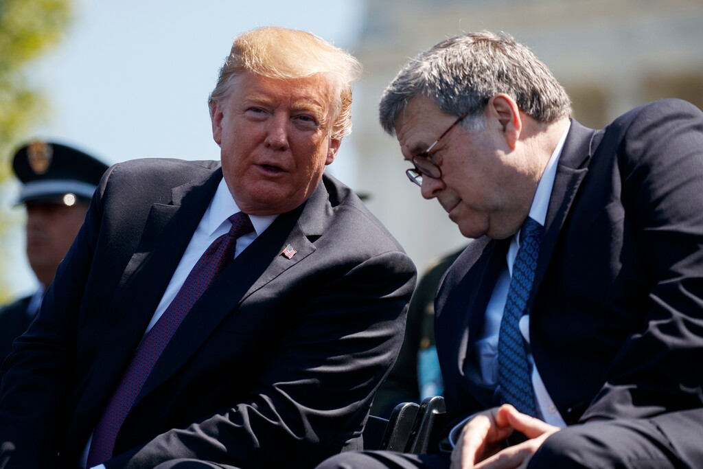 President Donald Trump talks with Attorney General William Barr during the 38th Annual National Peace Officers' Memorial Service at the U.S. Capitol, Wednesday, May 15, 2019, in Washington. (AP Photo/Evan Vucci)