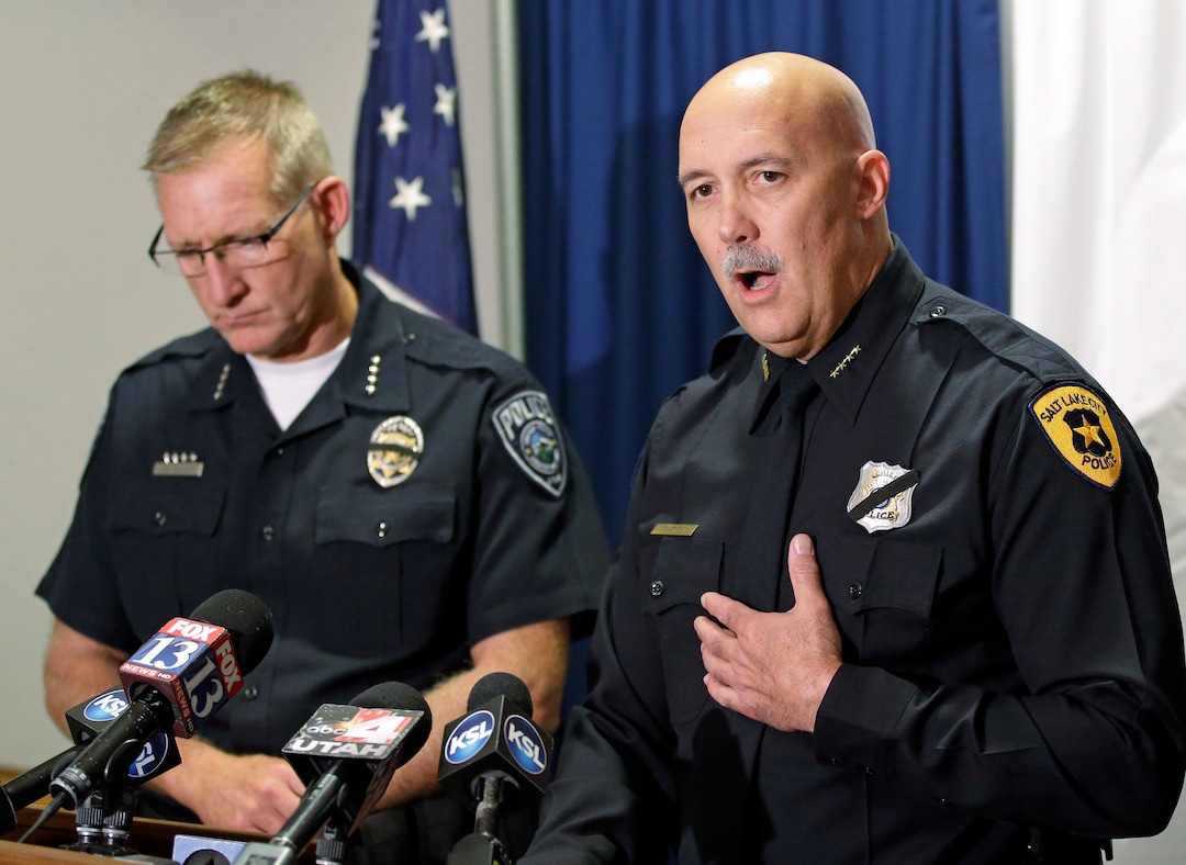 Salt Lake County Sheriff Jim Winder, left, and Salt Lake City Police Chief Mike Brown speak during a news conference Friday, July 8, 2016, in South Salt Lake, Utah. Brown and Winder said they weren't going to change police policies in the aftermath of the Dallas police shootings, but called on police and community to work together to break down barriers of mistrust. (AP Photo/Rick Bowmer)