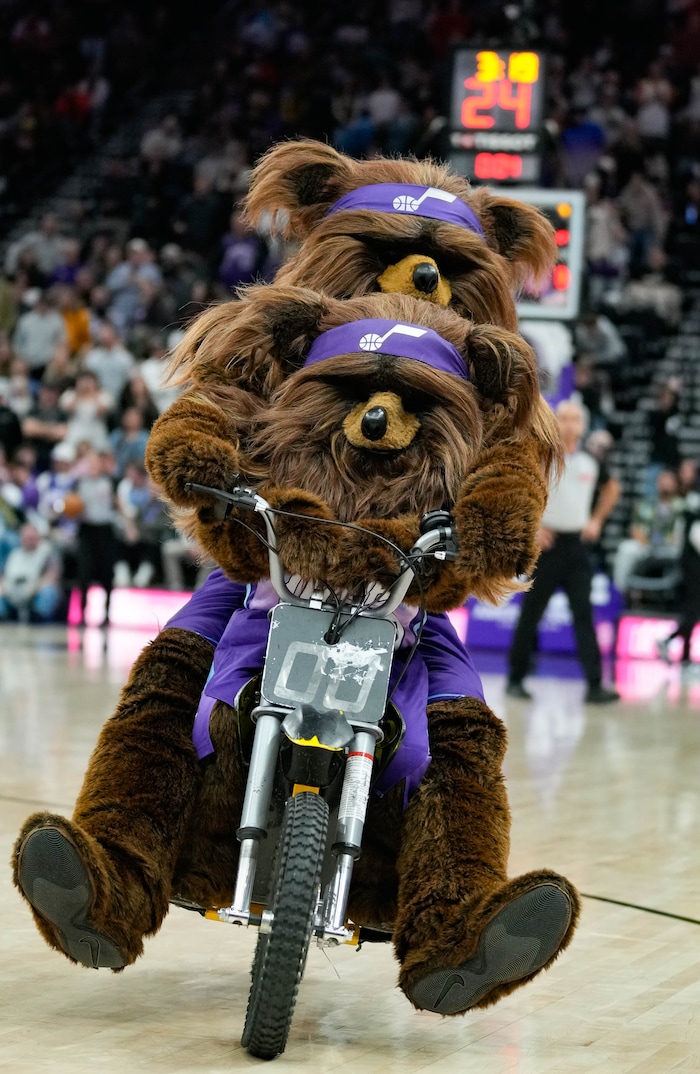 (Francisco Kjolseth  | The Salt Lake Tribune) Bear gains a temporary side-kick as the Utah Jazz host the Orlando Magic during NBA basketball at the Delta Center in Salt Lake City on Saturday, February. 1, 2025.
