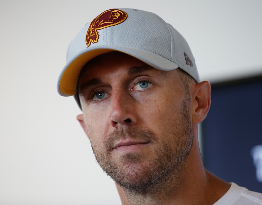 Washington quarterback Alex Smith answers questions after the morning session of the team's NFL football training camp in Richmond, Va., Thursday, July 26, 2018. (AP Photo/Steve Helber)