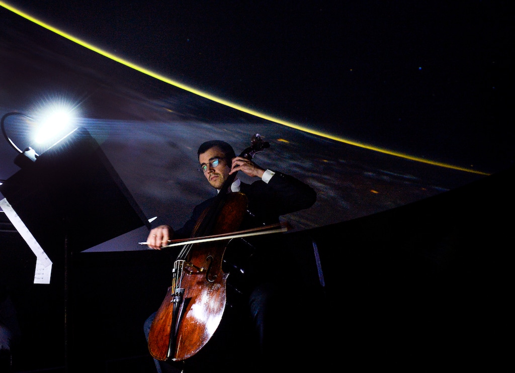 (Leah Hogsten | The Salt Lake Tribune) Utah Symphony principal cellist Rainer Eudeikis, who also performs with the Fremont String Quartet, plays in the Hansen Dome Theatre of the Clark Planetarium, Feb. 5, 2019, during a sneak preview of the Utah Symphony's 2019-20 season.