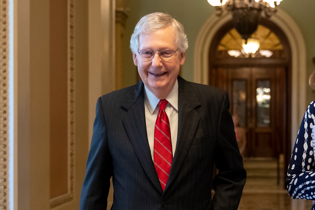 Senate Majority Leader Mitch McConnell, R-Ky., smiles after vote on a hard-won budget deal that would permit the government to resume borrowing to pay all of its obligations and would remove the prospect of a government shutdown in October, at the Capitol in Washington, Thursday, Aug. 1, 2019. (AP Photo/J. Scott Applewhite)