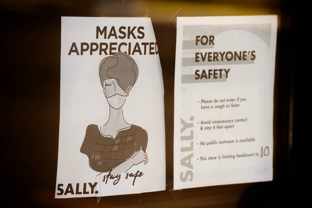 (Trent Nelson  |  The Salt Lake Tribune) A sign details health guidelines during the current yellow (low-risk) phase of Utah's COVID-19 effort, at Sally Beauty in Sandy on Tuesday, June 23, 2020.