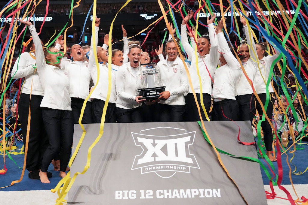 (Bethany Baker  |  The Salt Lake Tribune) The Utah Red Rocks celebrate their victory in the Big 12 Gymnastics Championship at Maverick Center in Salt Lake City on Saturday, March 22, 2025.