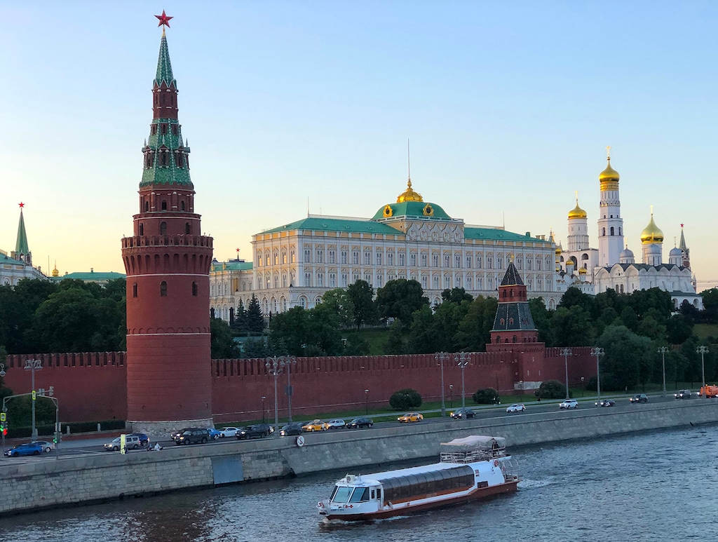 (Michael Stack  |  Special to The Salt Lake Tribune) The Presidential Palace and the Annunciation Cathedral stand side by side within the walls of the Kremlin on the Moskva River.