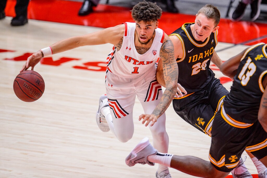 (Trent Nelson  |  The Salt Lake Tribune) Utah forward Timmy Allen, left, had a season-high 22 point as the Utes defeated Idaho 79-41 in Salt Lake City on Friday, Dec. 18, 2020.