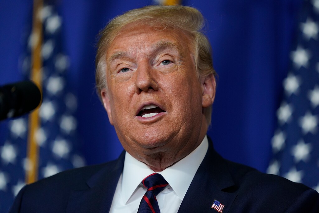 President Donald Trump speaks during a coronavirus briefing at Bioprocess Innovation Center at Fujifilm Diosynth Biotechnologies, Monday, July 27, 2020, in Morrisville, N.C. (AP Photo/Evan Vucci)