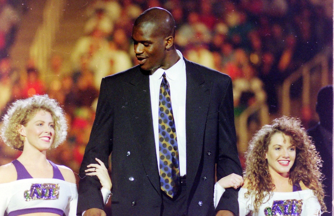 (Steve Griffin | Tribune file photo) Shaquille O'Neal is escorted onto the court by two Jazz dancers, during the 1993 All-Star festivities, in the Delta Center in Salt Lake City, Saturday, Feb. 20, 1993.