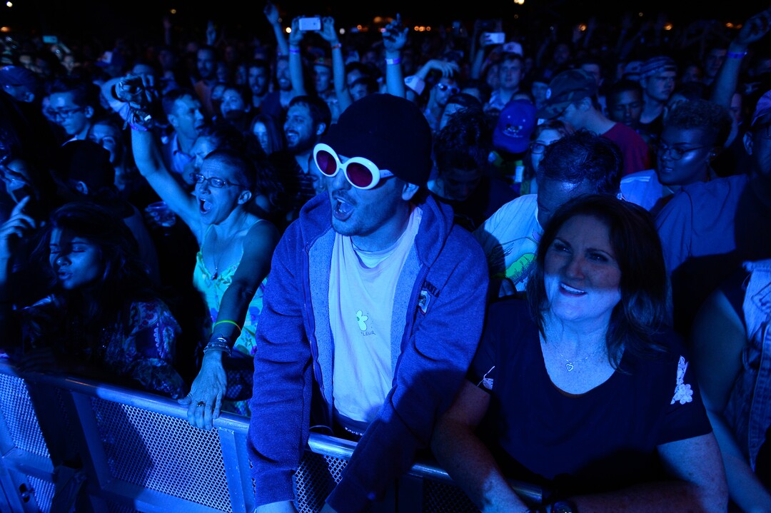 (Francisco Kjolseth  |  The Salt Lake Tribune)  Alec Pharo, center, takes in the music as The Roots marks the finale of the 2017 SLC Twilight Concert Series at Pioneer Park on Thursday, Aug. 31, 2017.