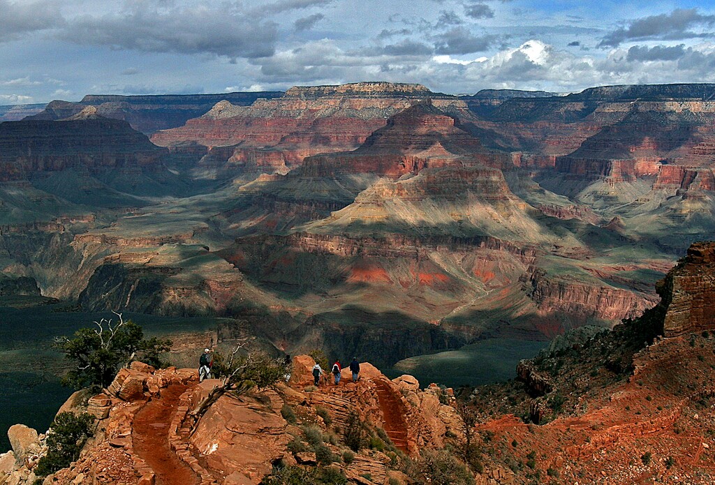 (Rick Hossman | AP file photo) Tourists hike along the South Rim of the Grand Canyon in Grand Canyon, Ariz.