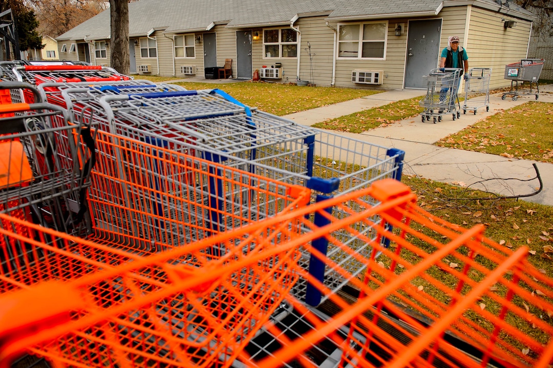 (Trent Nelson  |  The Salt Lake Tribune) 
Antonio Hernandez collects shopping carts in Salt Lake City on Tuesday, Nov. 19, 2019. Hernandez, an employee of Romac, is assigned to drive around the city and pick up stolen or abandoned shopping carts for return to stores.