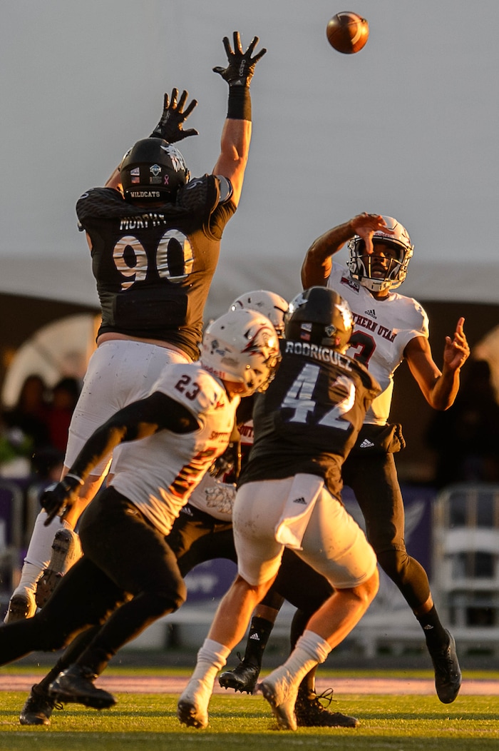 (Trent Nelson | The Salt Lake Tribune)  Southern Utah Thunderbirds quarterback Patrick Tyler (3) passes while Weber State Wildcats defensive tackle McKay Murphy (90) reaches for the ball as Weber State hosts Southern Utah, NCAA football in Ogden Saturday October 14, 2017.