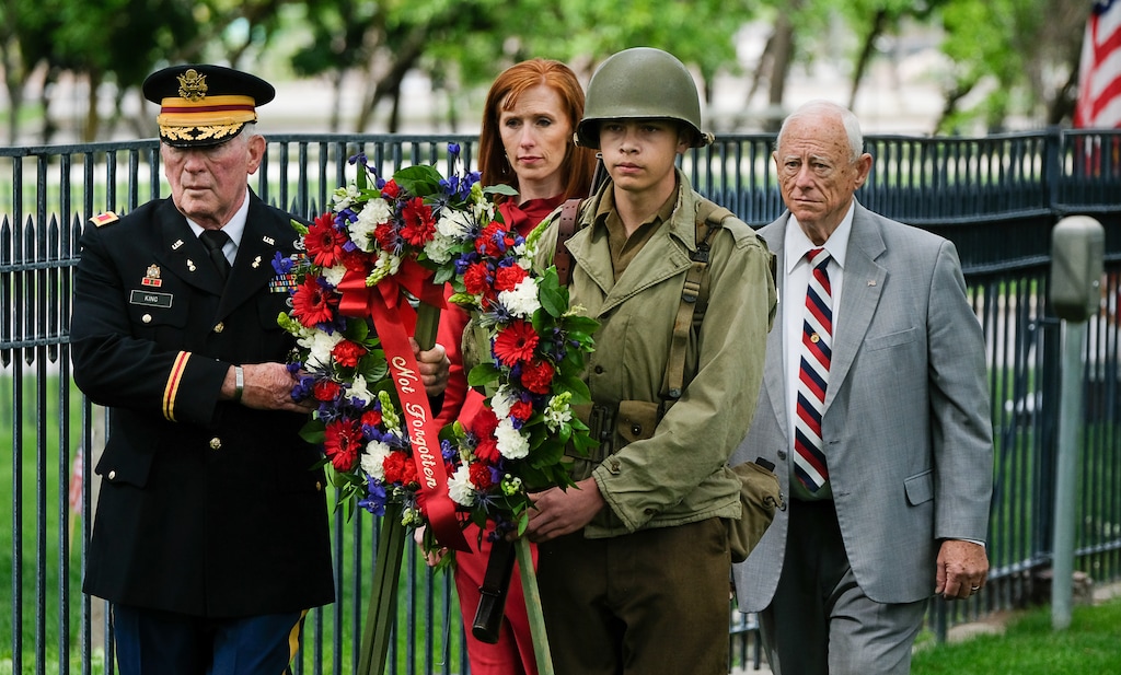 (Francisco Kjolseth | The Salt Lake Tribune) Retried Army Colonel Ed King is joined by Ian Herbert in WWII period clothing as they perform a laying of the wreath ceremony with Gold Star wife Jennie Taylor and Association of the United States Army - Utah chapter president Fred Allen at Fort Douglas Cemetery on Monday, May 27, 2019.