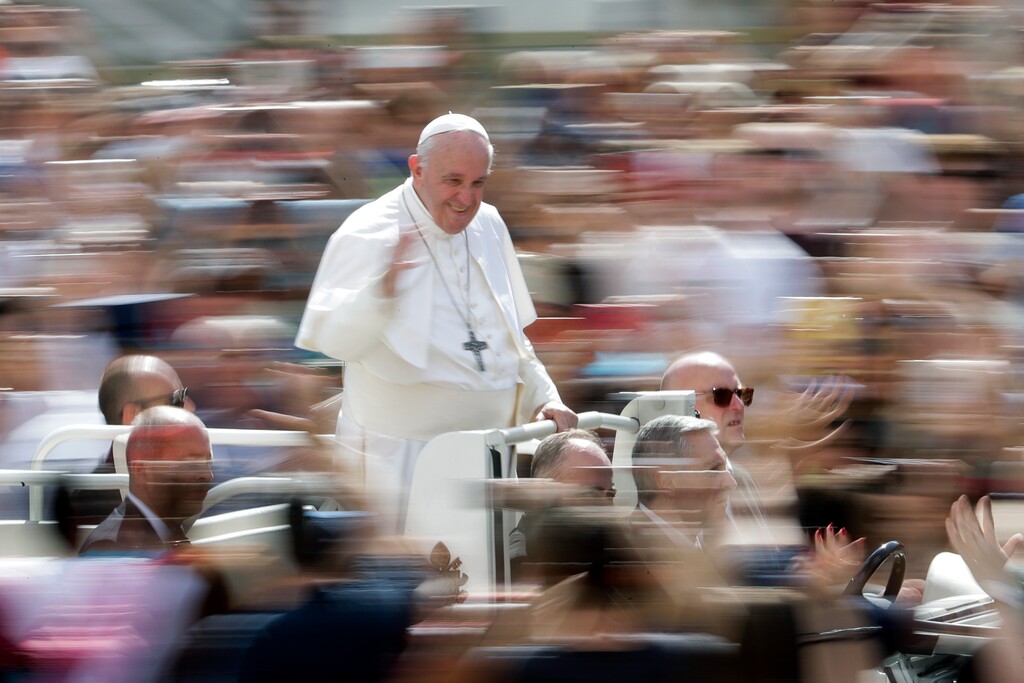 (AP Photo/Andrew Medichini) Pope Francis greets faithful after celebrating Mass on the occasion of the Migrant and Refugee World Day, in St. Peter's Square, at the Vatican, Sunday, Sept. 29, 2019.