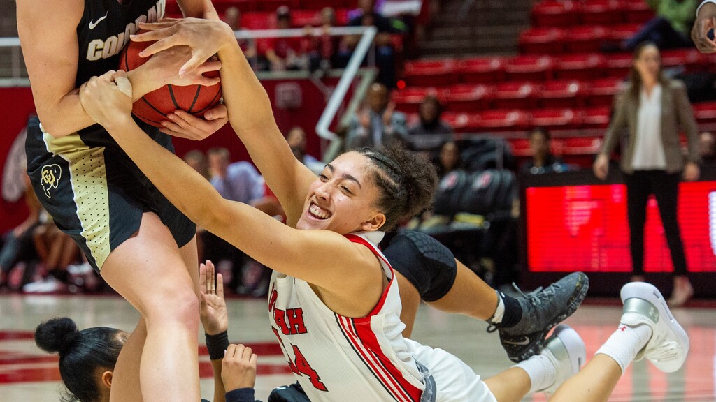 (Rick Egan  |  The Salt Lake Tribune) Utah Utes guard Niyah Becker (14) tries to grab the ball from Colorado Buffaloes guard Emma Clarke (3), in Pac-12 basketball action at the Jon M. Huntsman Center, Sunday, Dec. 29, 2019.