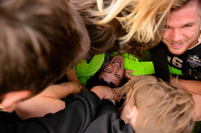 (Trent Nelson | The Salt Lake Tribune)  Desert Hills players celebrate their win over Park City High School in the 4A state championship game, Saturday May 12, 2018.