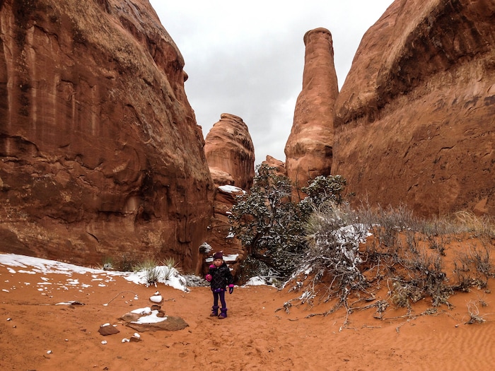 (Erin Alberty  |  The Salt Lake Tribune) 

The author's daughter explores the rock formations near the Devils Garden campground, the trailhead for the Broken Arch loop hike, on Nov. 29, 2015 at Arches National Park.