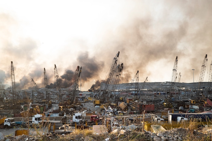 Aftermath of a massive explosion is seen in in Beirut, Lebanon, Tuesday, Aug. 4, 2020. Massive explosions rocked downtown Beirut on Tuesday, flattening much of the port, damaging buildings and blowing out windows and doors as a giant mushroom cloud rose above the capital. Witnesses saw many people injured by flying glass and debris. (AP Photo/Hassan Ammar)