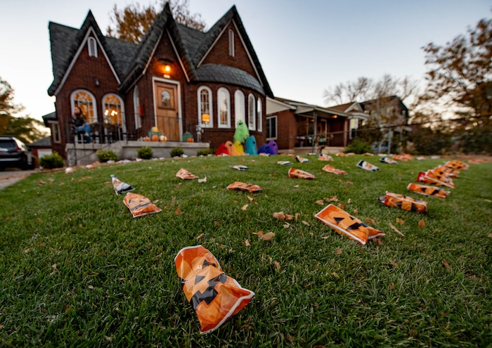 (Francisco Kjolseth  |  The Salt Lake Tribune) Treat bags are laid out on the lawn of Jenny Bonk’s home as she waits for trick or treaters after signing up for the SugarHood Halloween as a treat giving household agreeing to abide by CDC Covid safety standards on Saturday, Oct. 31, 2020.